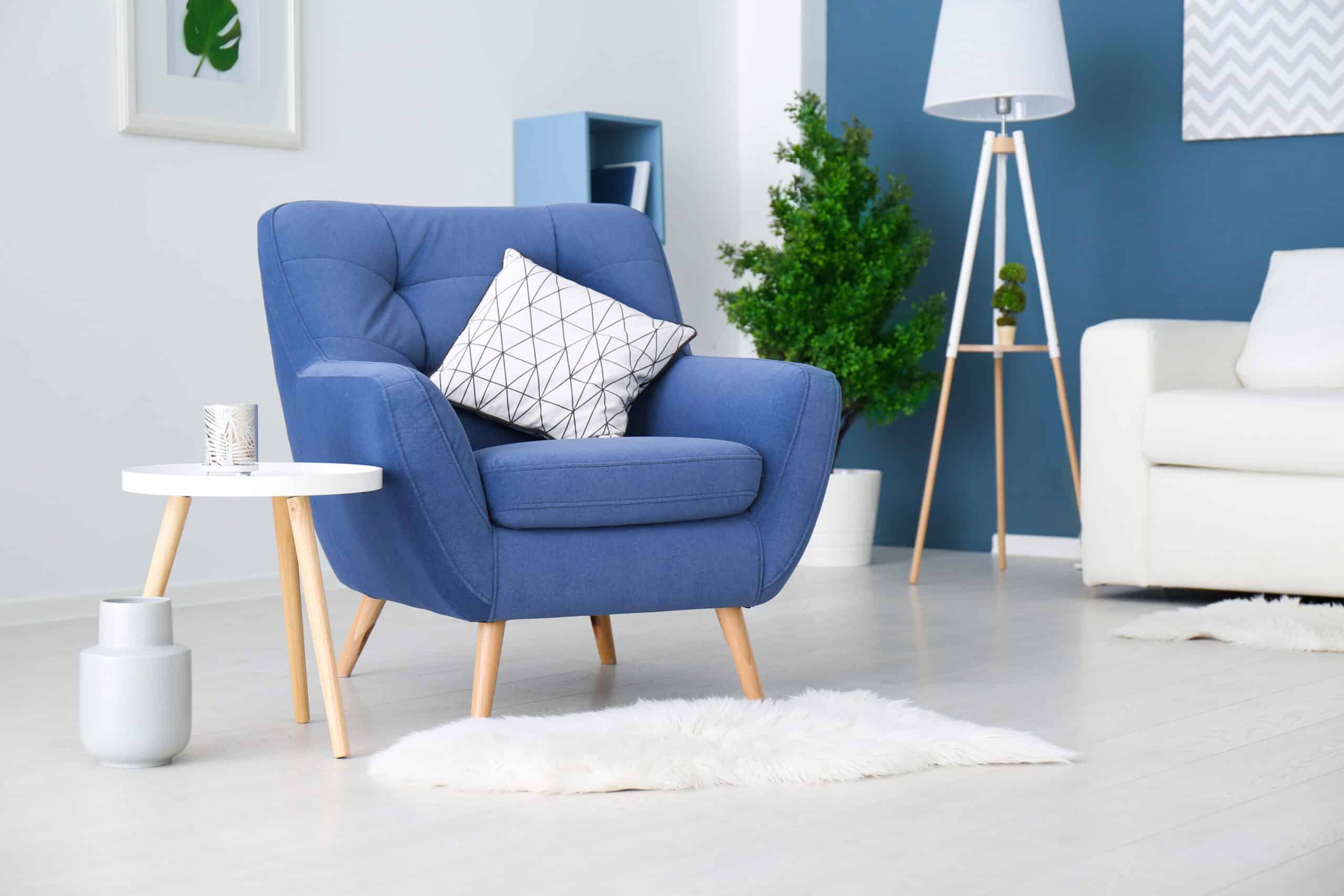 Trendy room interior with modern color armchair